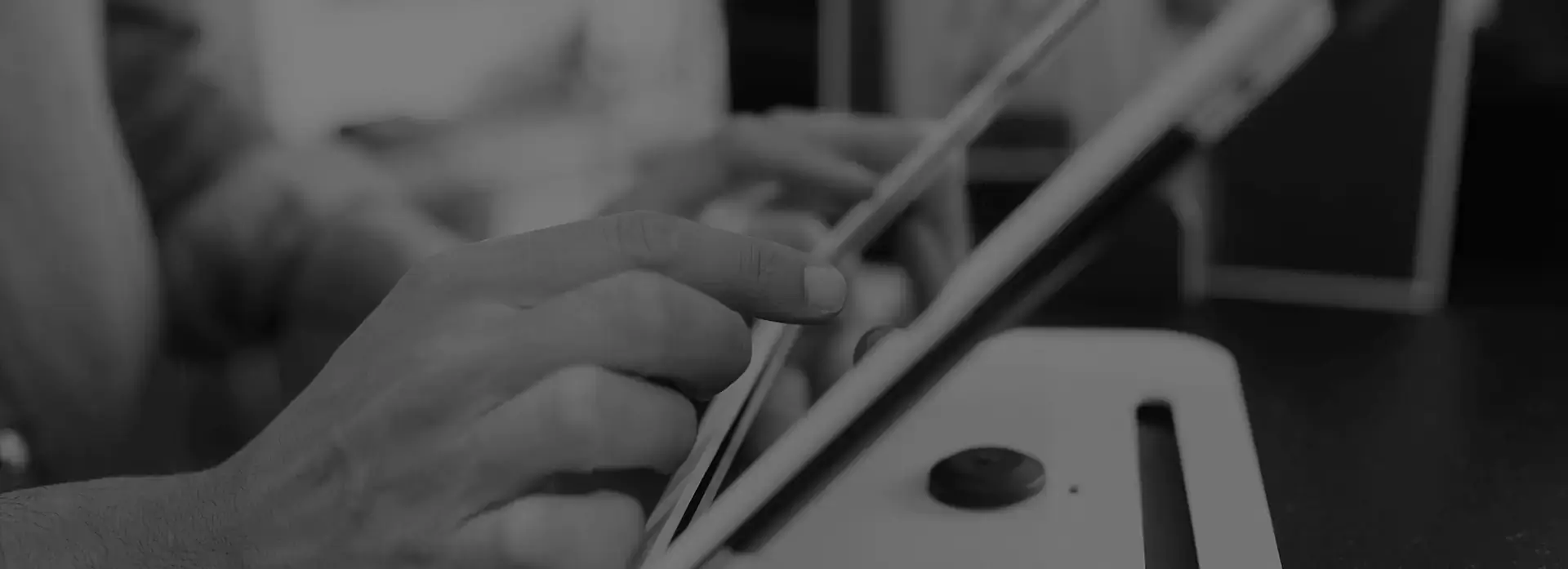 person using a touchscreen POS