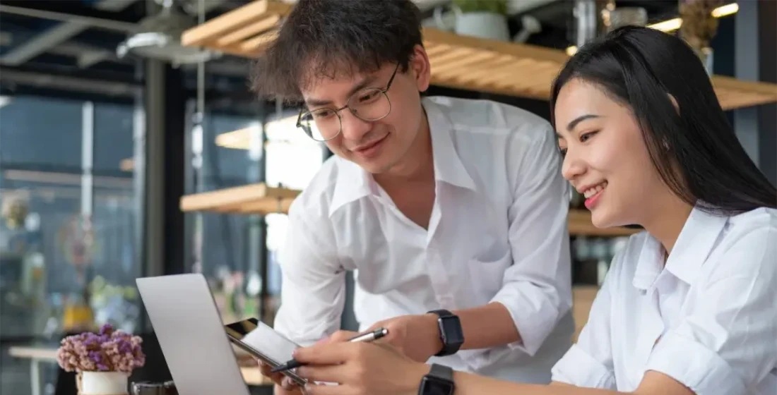 Business owners reviewing Worldpay vs Sekure Payment Processing