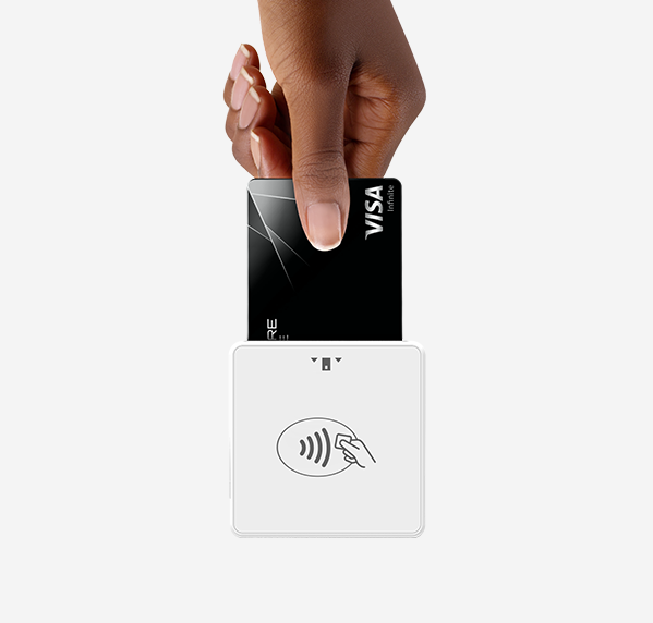 person inserting their credit card into mobile POS card reader